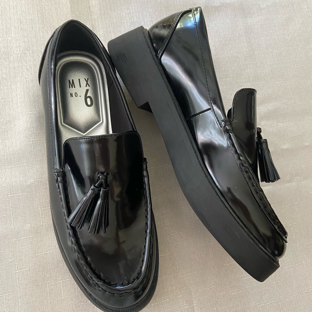 Black chunky loafers with tassels